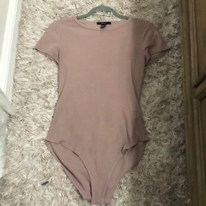 Mauve pink short sleeve bodysuit.